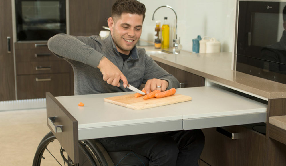 Accessible pull out drawer in an accessible kitchen